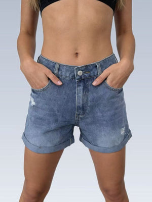Light blue cuffed denim shorts with distressed details and high waist.