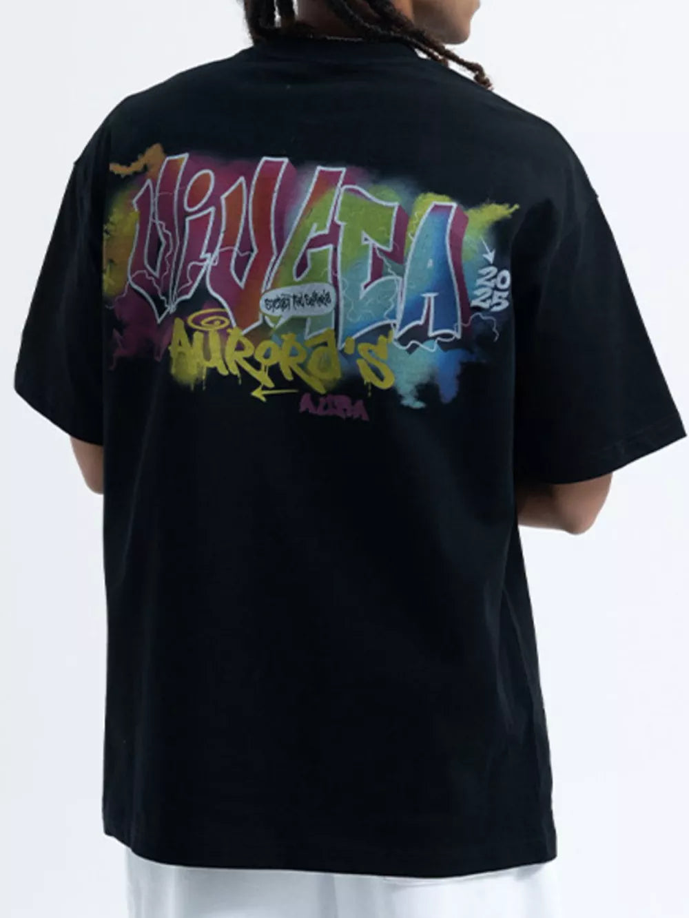 Black cotton t-shirt with bold, colorful graffiti print on back.