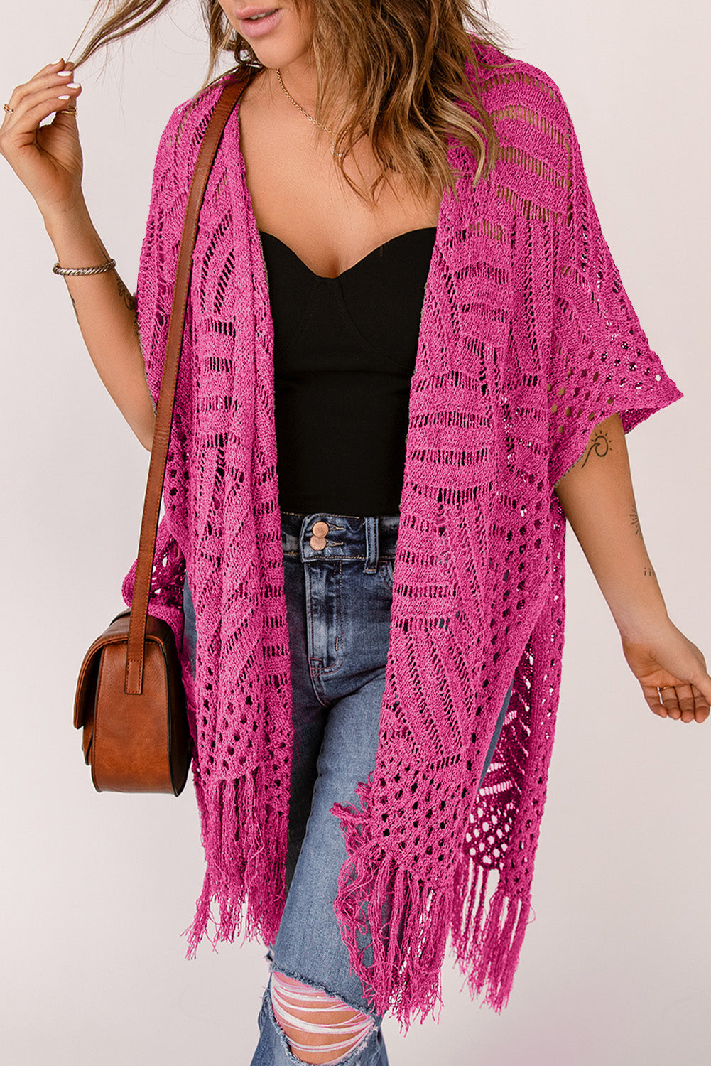 Hot Pink open knit chevron fringe cardigan with short sleeves and a relaxed fit.