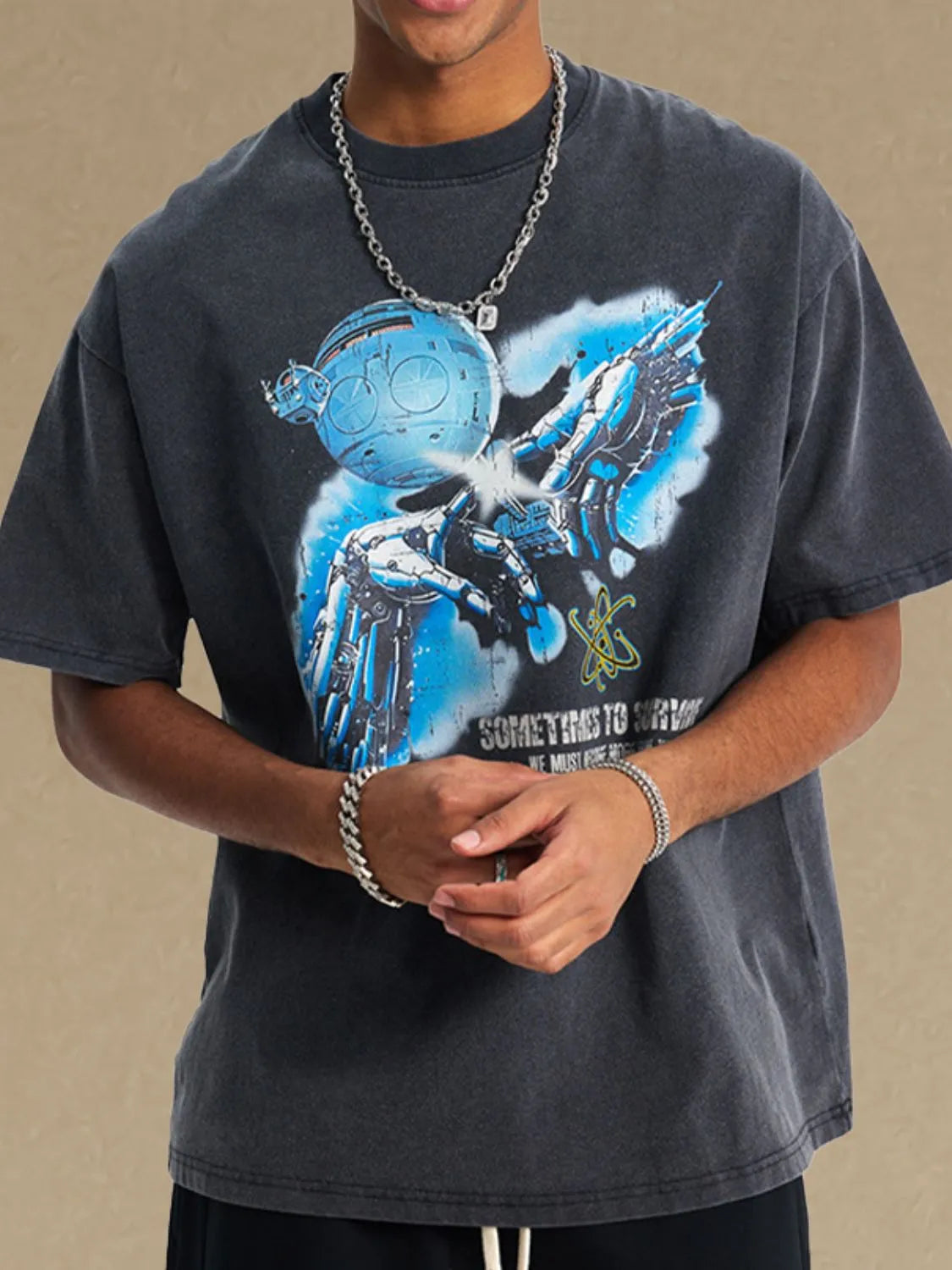 Washed black graphic tee with blue robot and text print.