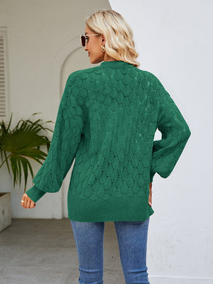 Mid Green open-knit balloon sleeve cardigan with textured pattern and ribbed hem.