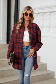 Oversized red and black plaid shacket with button front and chest pockets.