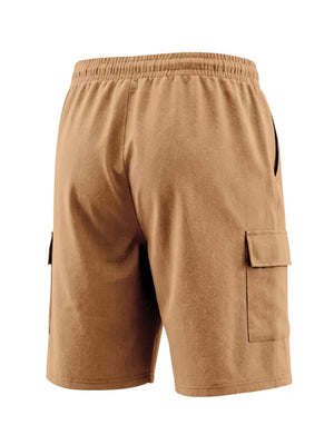 Apricot cargo shorts with drawstring waist and crinkled texture.