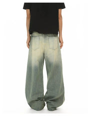 Timeless wide leg denim trousers in light blue wash with a relaxed fit.