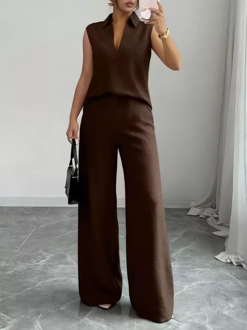 Chocolate sleeveless collared top and wide-leg pants set with V-neck.