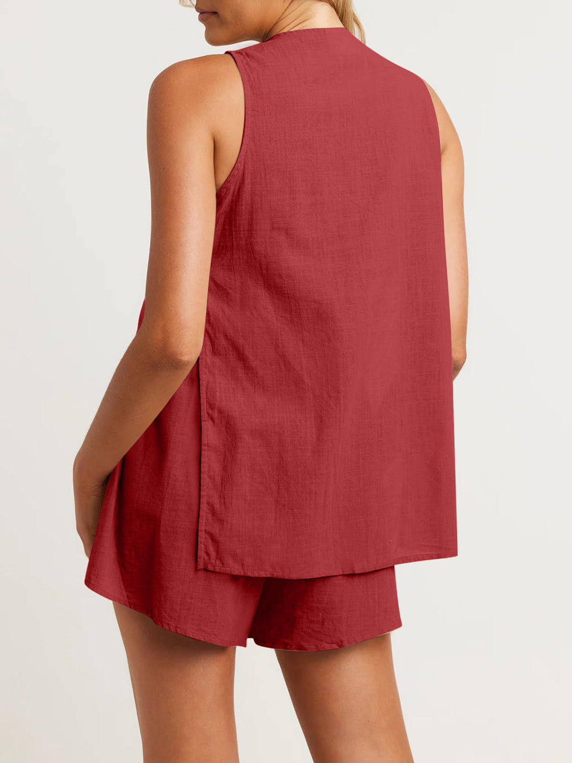 Scarlet linen co-ord set with cut-out back detail and button closure.