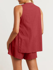 Scarlet linen co-ord set with cut-out back detail and button closure.