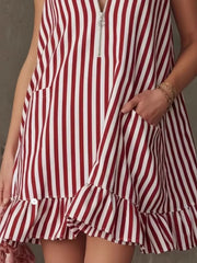 Striped mini dress with zipper, pockets, and ruffle hem in Burgundy.