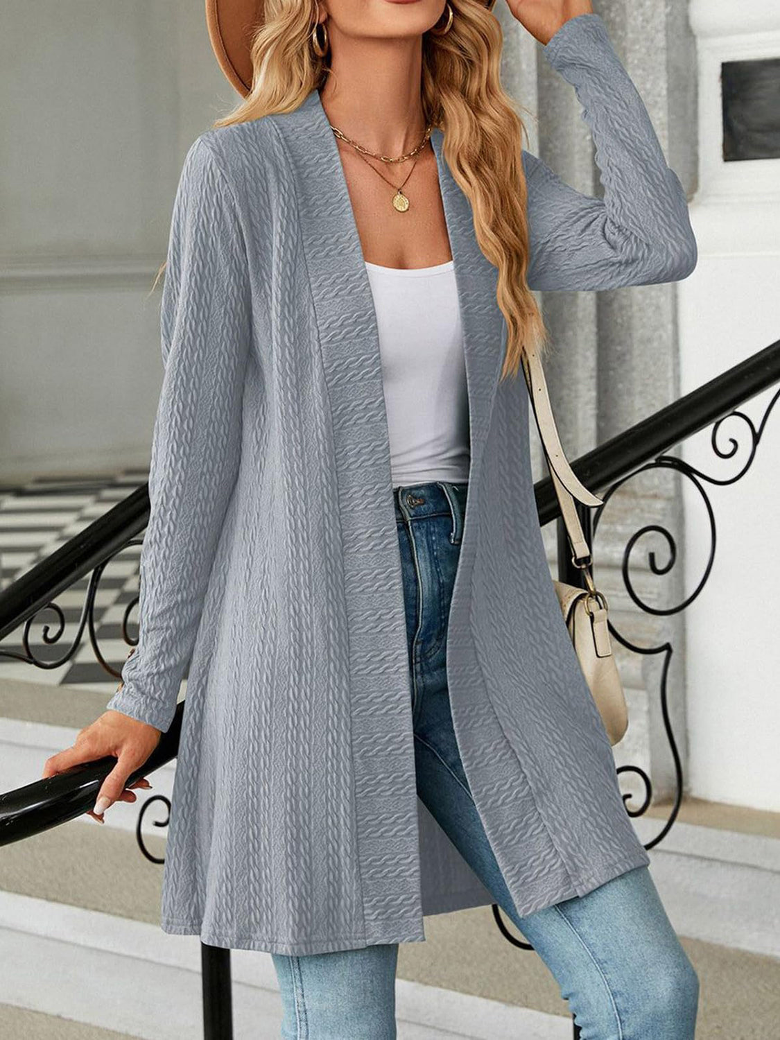 Textured knit longline cardigan in gray with open front and long sleeves.