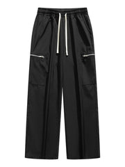 Black wide-leg cargo pants with drawstring and zippered pockets