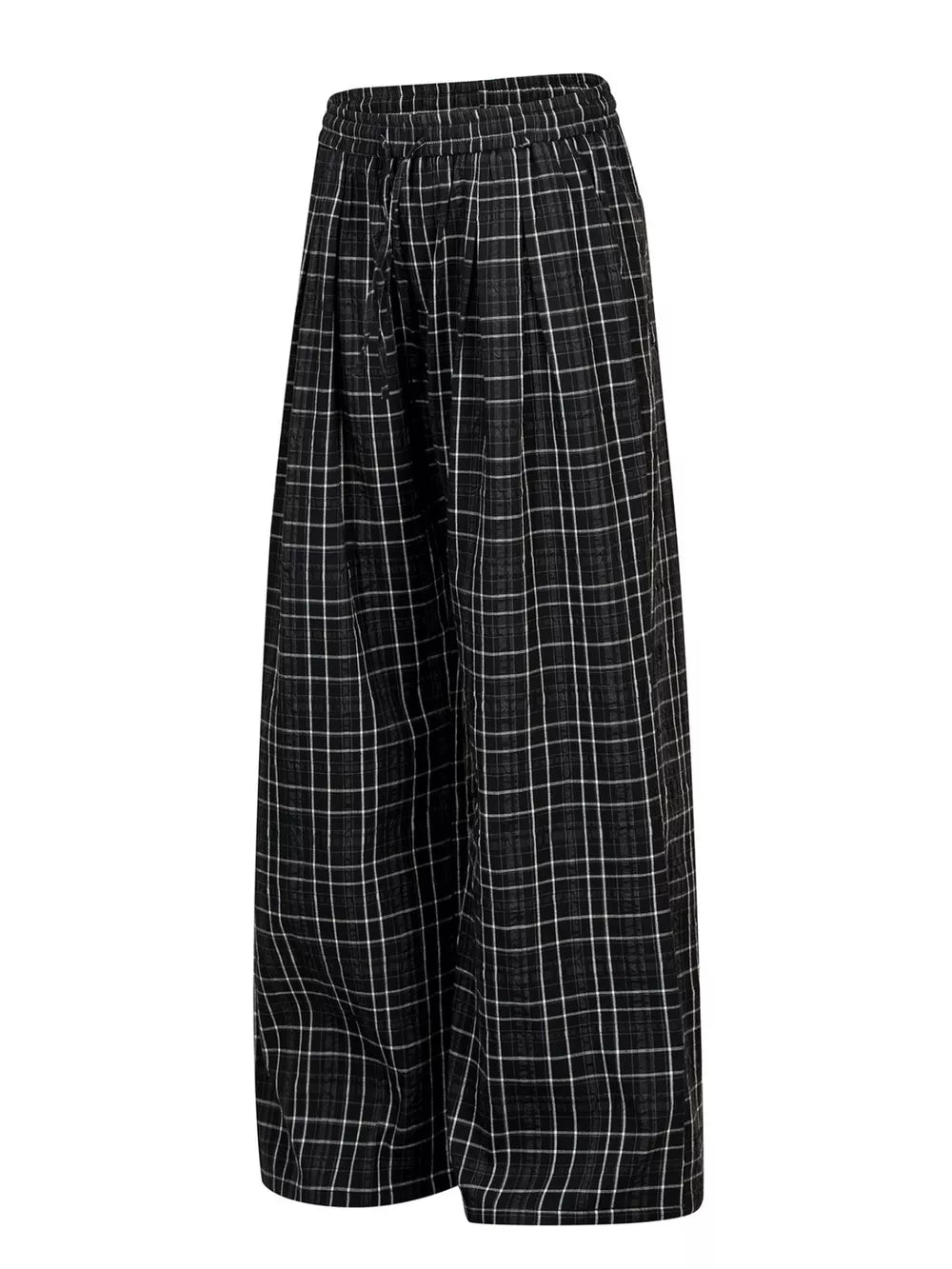 Plaid wide-leg sweatpants with drawstring waist in black and white check.