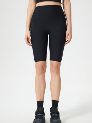 Black ribbed contour cycling shorts with a high waist.