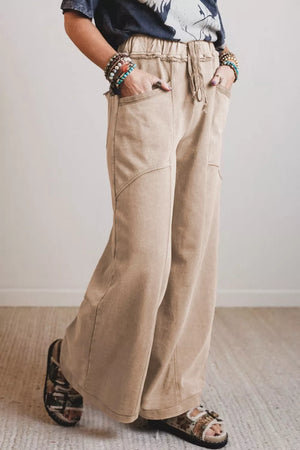 Mineral wash cotton wide leg maternity pants with drawstring waist and pockets.
