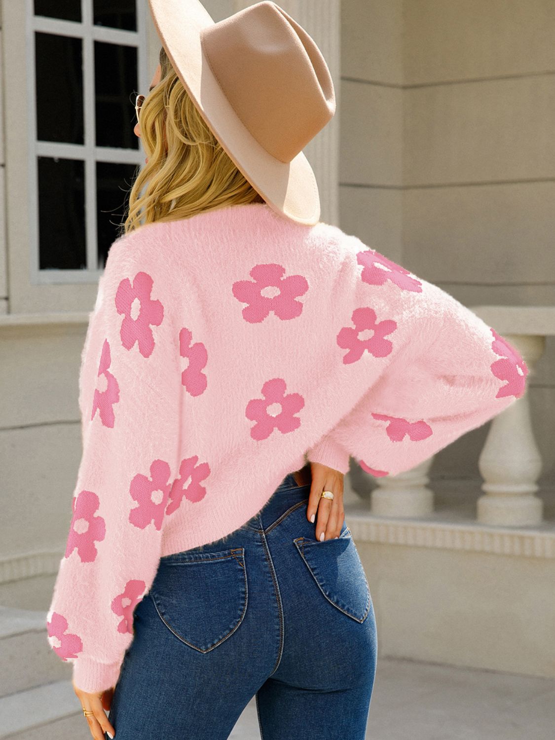 Blush pink acrylic floral puff sleeve cardigan with a fuzzy texture.