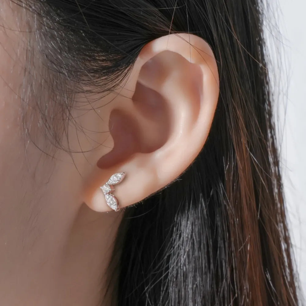 Silver moissanite leaf cluster stud earrings with 18K gold plating.