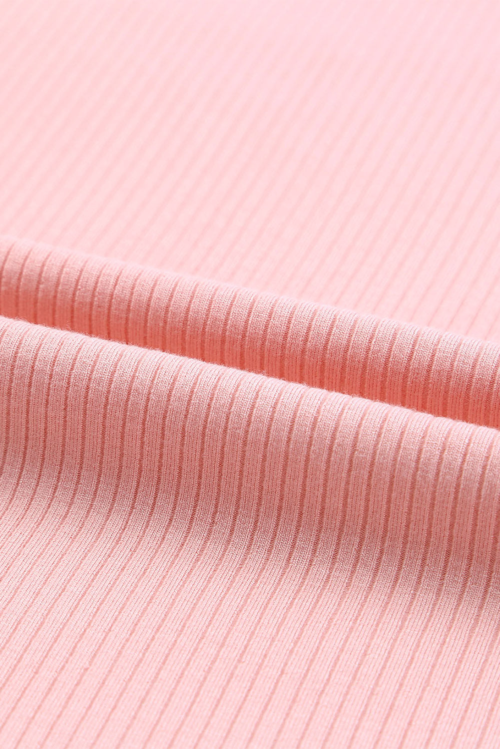 Blush pink ribbed knit blouse with tulle ruffle sleeves detail