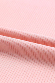 Blush pink ribbed knit blouse with tulle ruffle sleeves detail