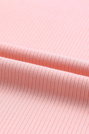 Blush pink ribbed knit blouse with tulle ruffle sleeves detail