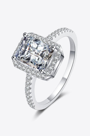 Radiant cushion cut halo ring in silver with pave band.