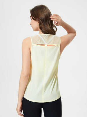 Yellow mesh-back performance tank top with cutout detail and racerback straps.