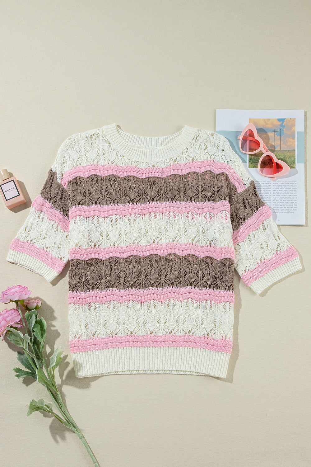 Striped openwork knit top with pink, taupe, and white stripes.