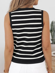 Black and white striped knit top with a mock neck and sleeveless design.