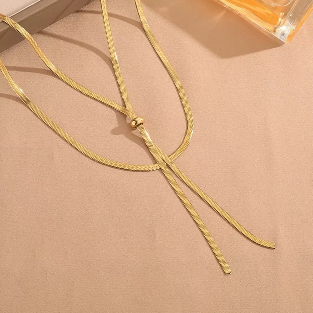 Gold layered snake chain necklace with adjustable knot detail
