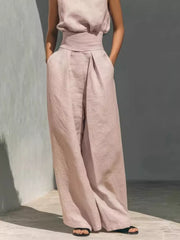 Sleeveless Wide-leg Jumpsuit With Smocked Waist in Apricot, editorial view