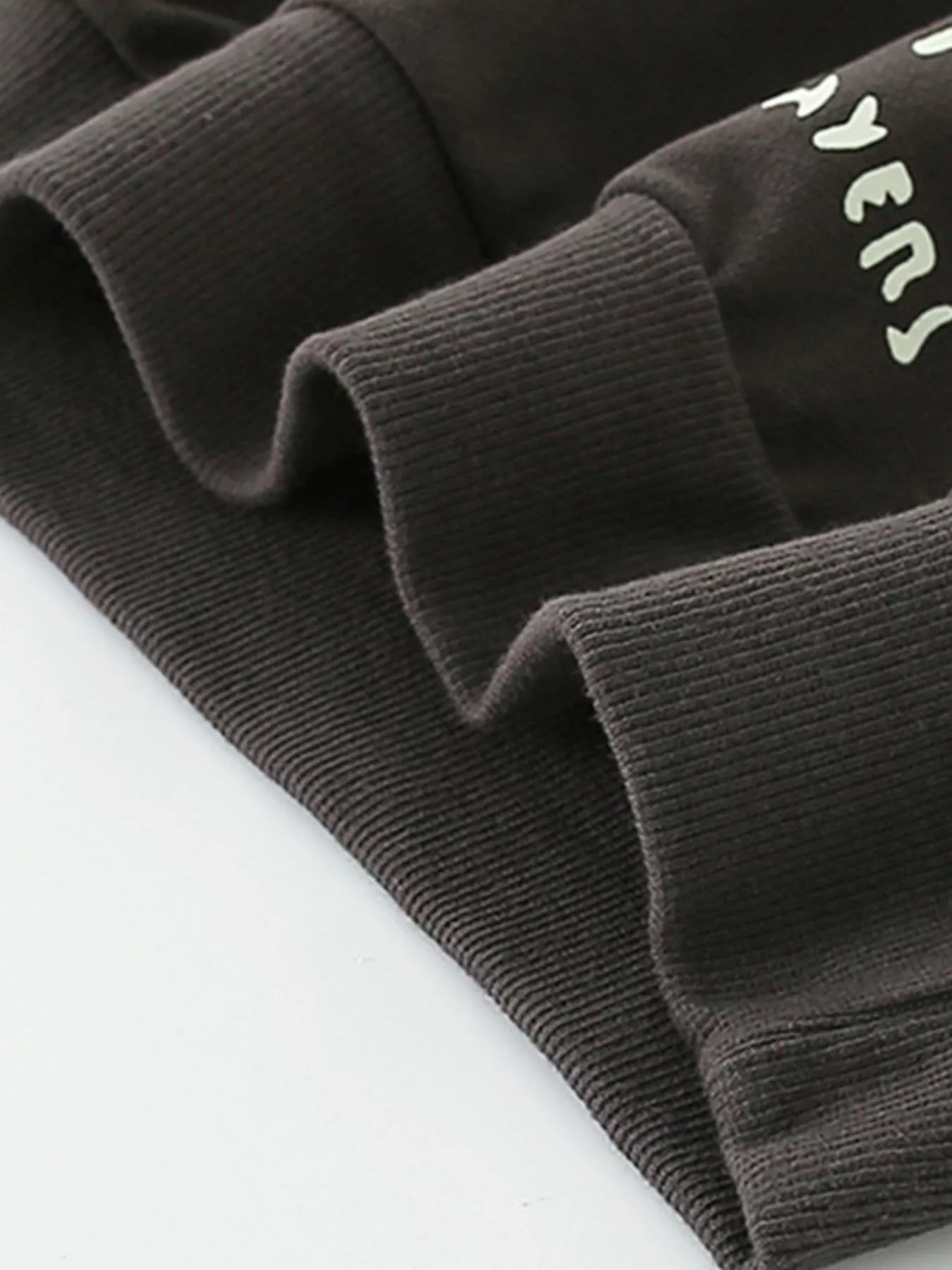 Coffee brown cotton blend sweatshirt with graphic detail and ribbed cuffs.