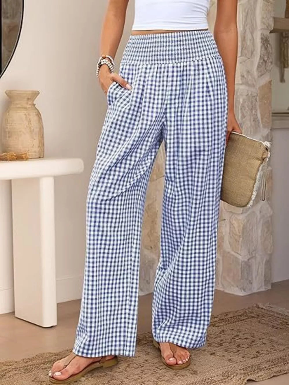 Blue plaid maternity pants with smocked waistband and wide legs.