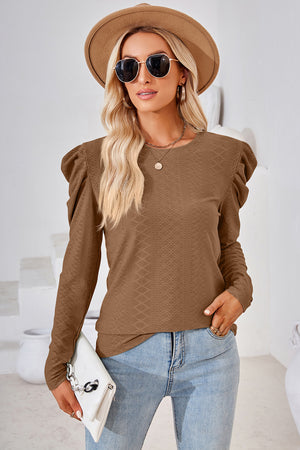 Textured puff-sleeve crew neck top in Mocha with allover diamond pattern.