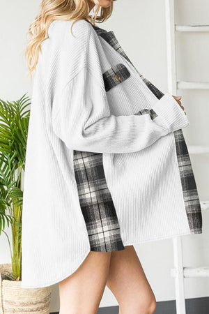 White waffle knit overshirt with plaid trim and button pocket detail.