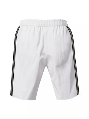 White men's bermuda shorts with black and green side stripes and drawstring waist.