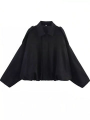 Black oversized zip-up jacket with collar and shoulder details