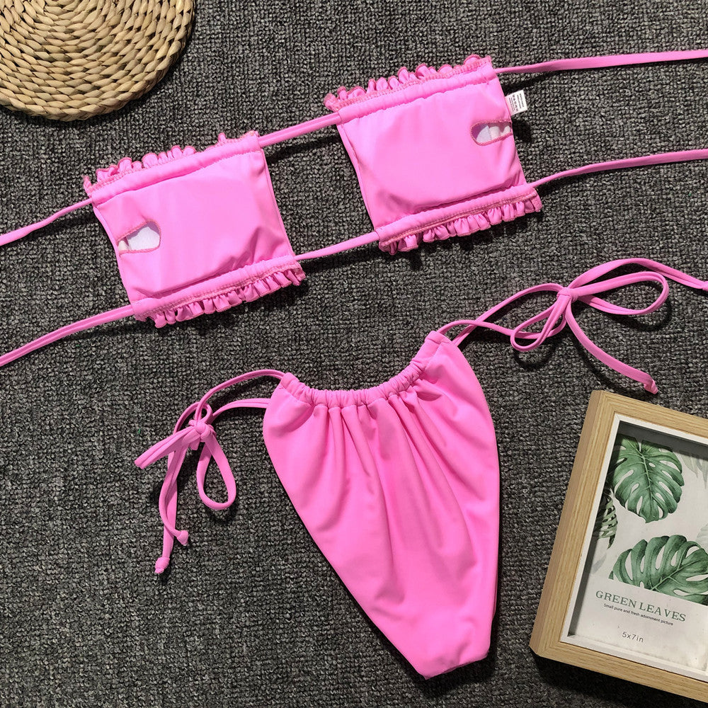 Pink bandeau bikini set with ruffle trim and tie sides.