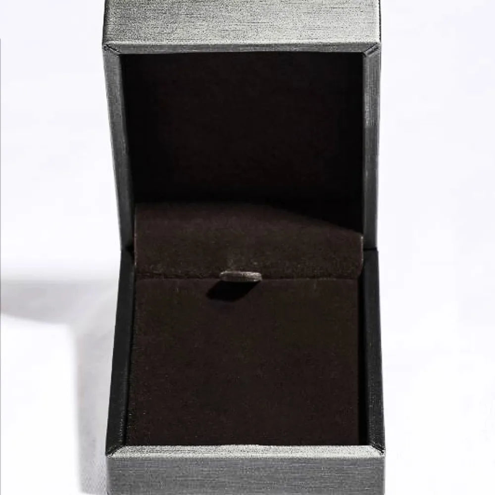 Silver jewelry box with dark velvet interior