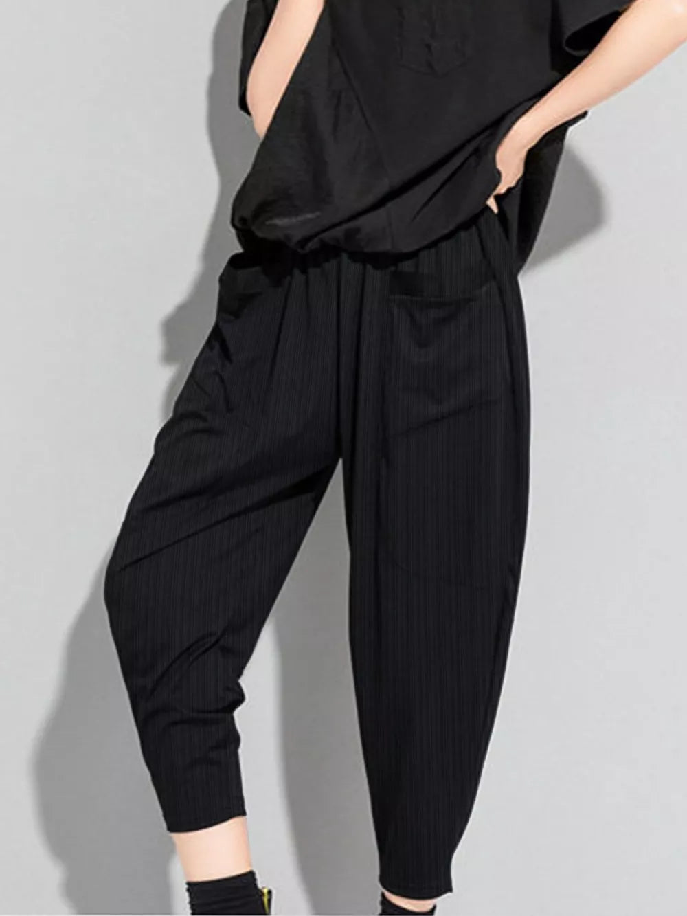 Black pinstripe harem maternity pants with pockets and elastic waist