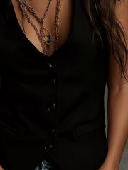 Black velvet button-down vest coat with deep V-neck and pocket details.
