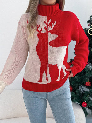 Red and cream colorblock knit sweater with reindeer graphic and turtleneck.
