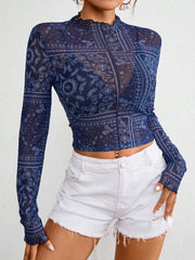Bandana print mesh mock neck top in dark blue with lettuce trim.