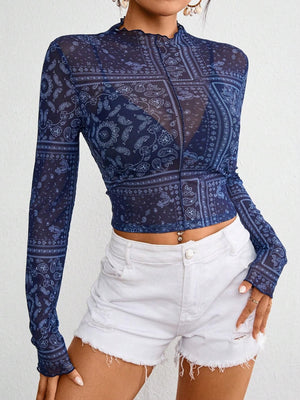Bandana print mesh mock neck top in dark blue with lettuce trim.