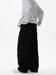Black cargo pants with multiple versatile pockets and a relaxed fit.