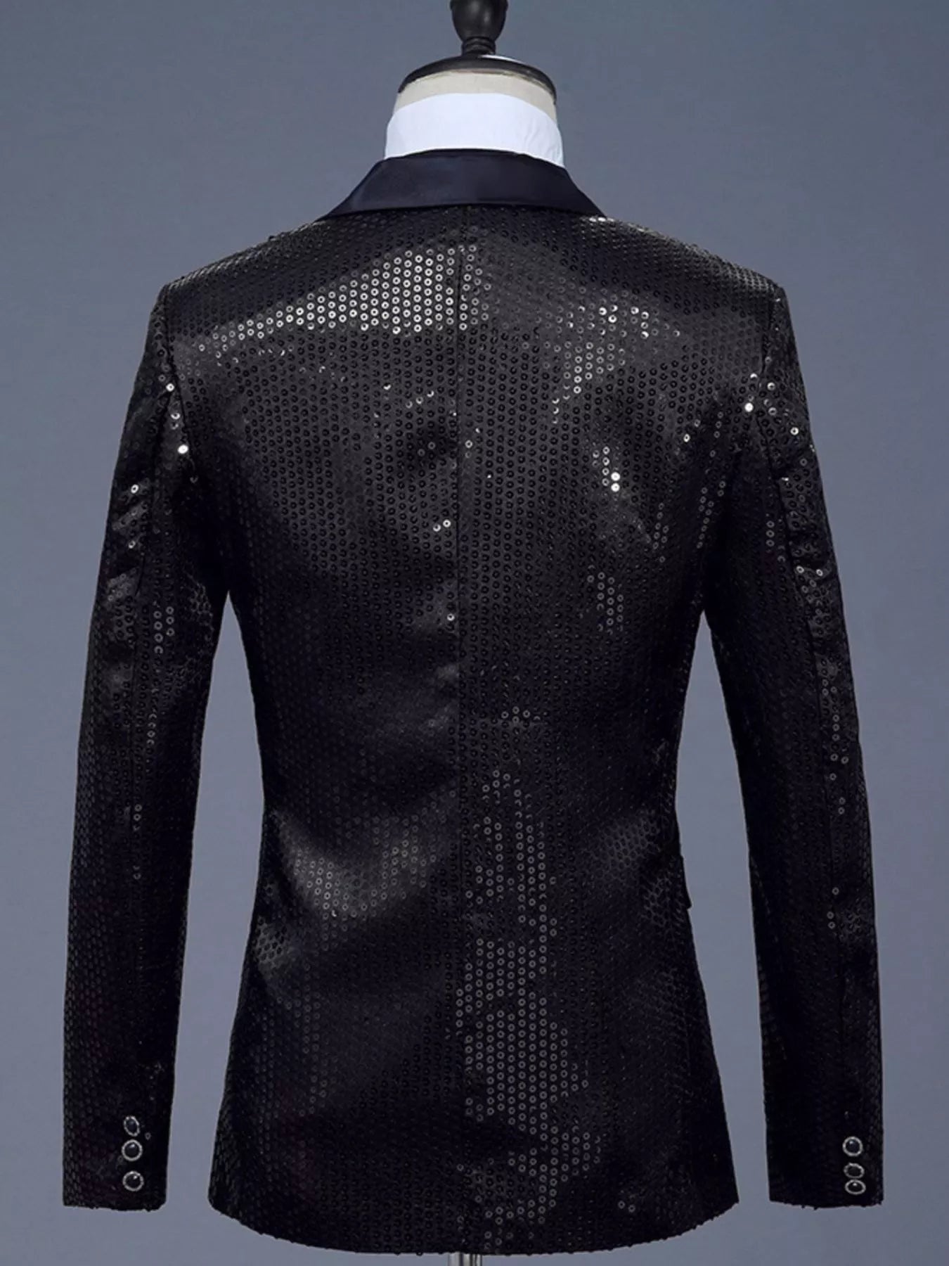 Men's black sequin one button blazer with satin lapels and three button cuffs.
