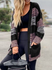 Colorblock knit cardigan with pockets in black, featuring a striped pattern and open front.