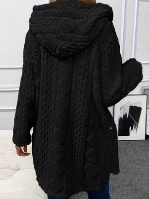 Black hooded trench coat with cable knit texture and button detail