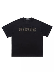 Black oversized cotton t-shirt with textured logo detail on chest