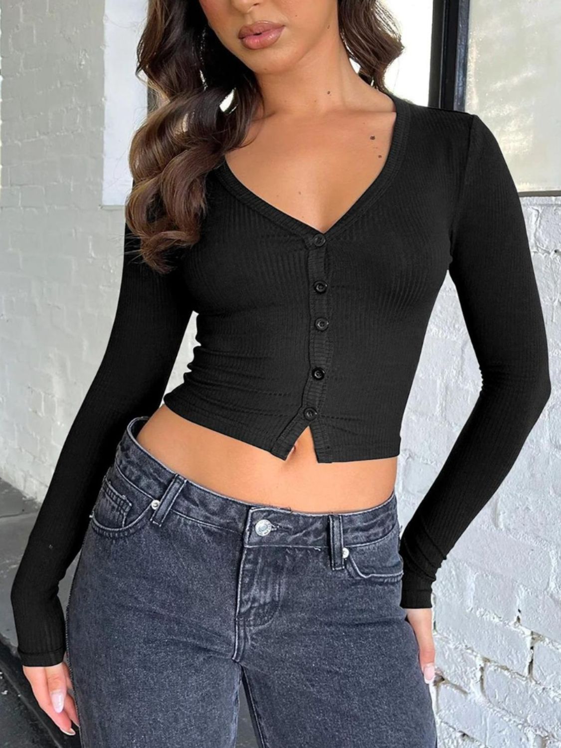 Black ribbed V-neck crop top with button front and long sleeves