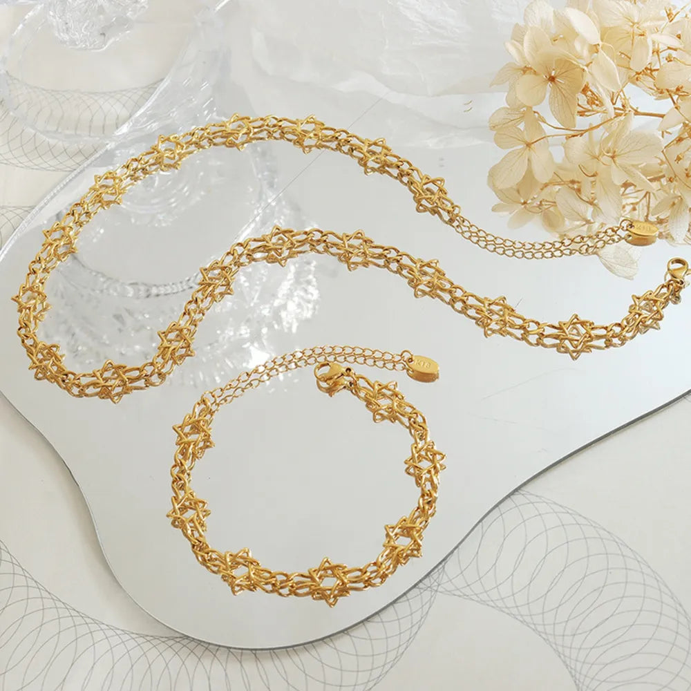 Gold brass necklace and bracelet set with star-shaped links