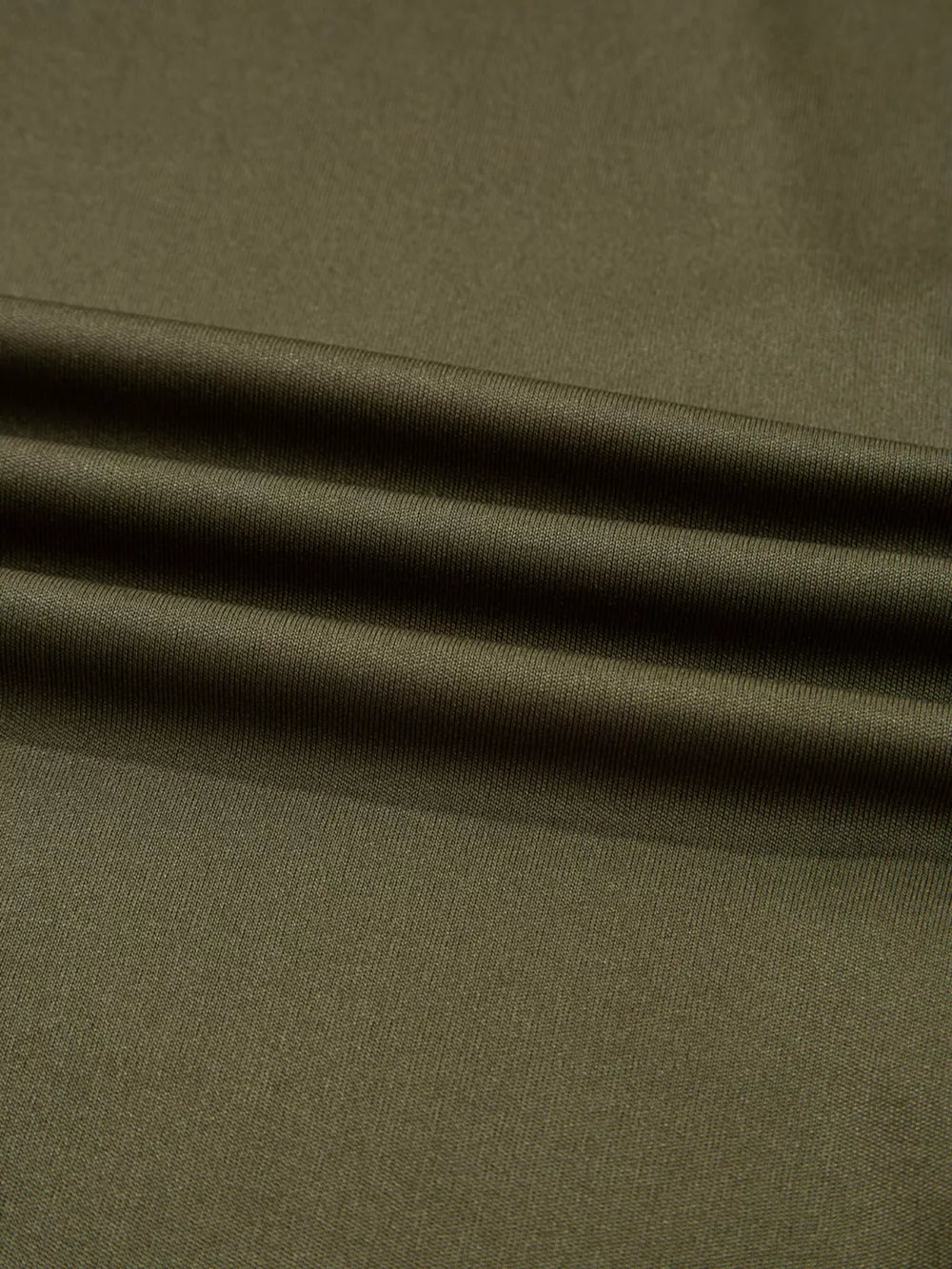 Army green midi skirt fabric detail with soft folds