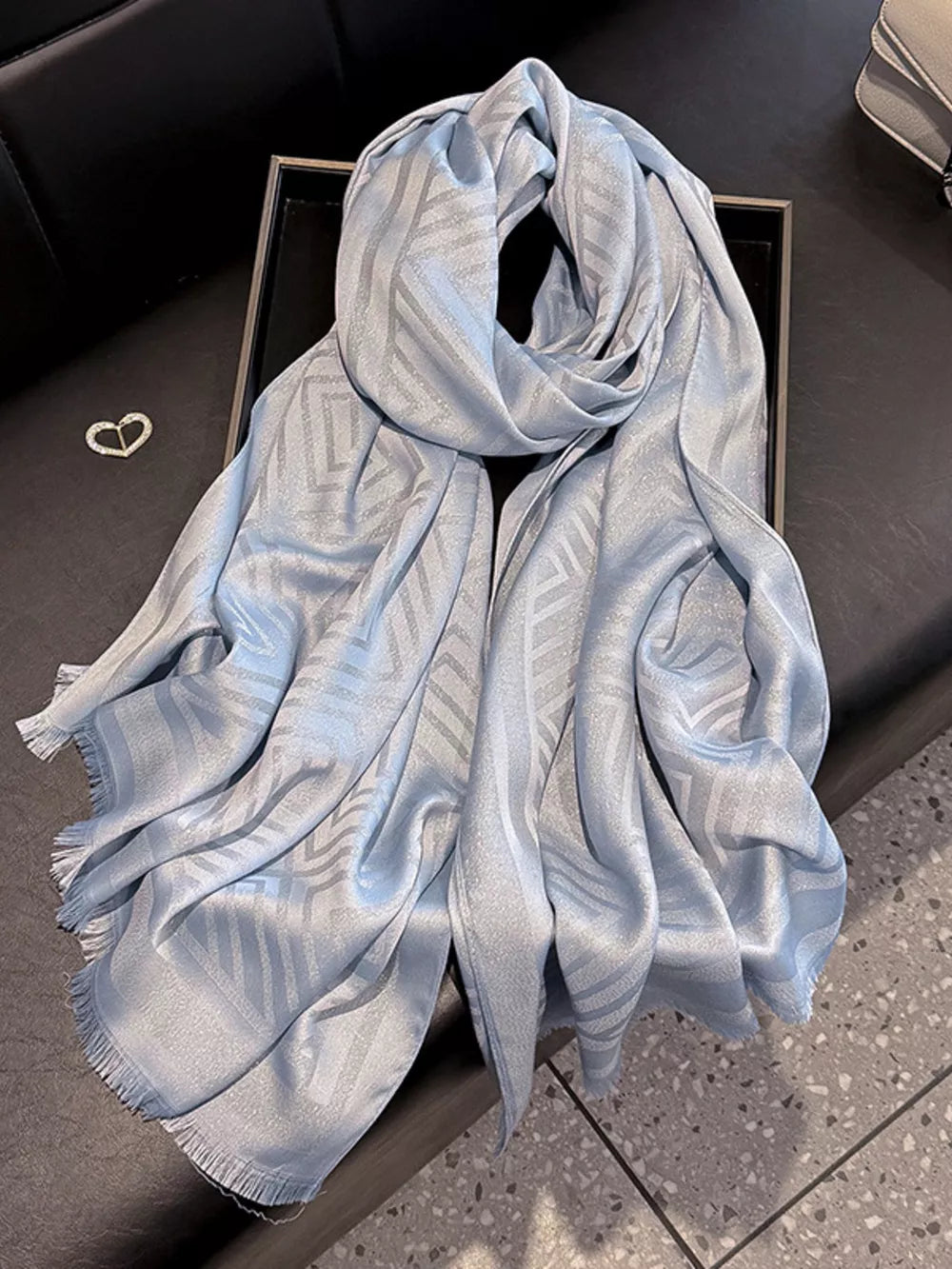 Elegant blue Tencel cotton scarf with geometric pattern and fringe detail